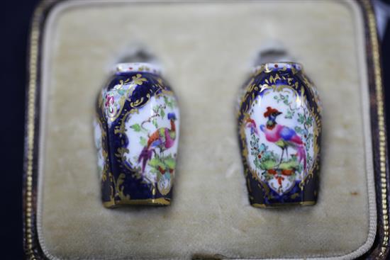 A pair of Royal Worcester miniature hexagonal scale blue jars and covers, c.1910, height 3.5cm, in a fitted case
